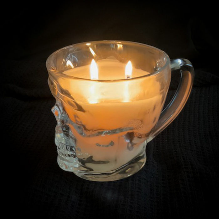 skull mug candle lit