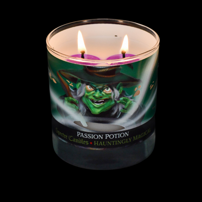 spectre candles passion potion candle, lit